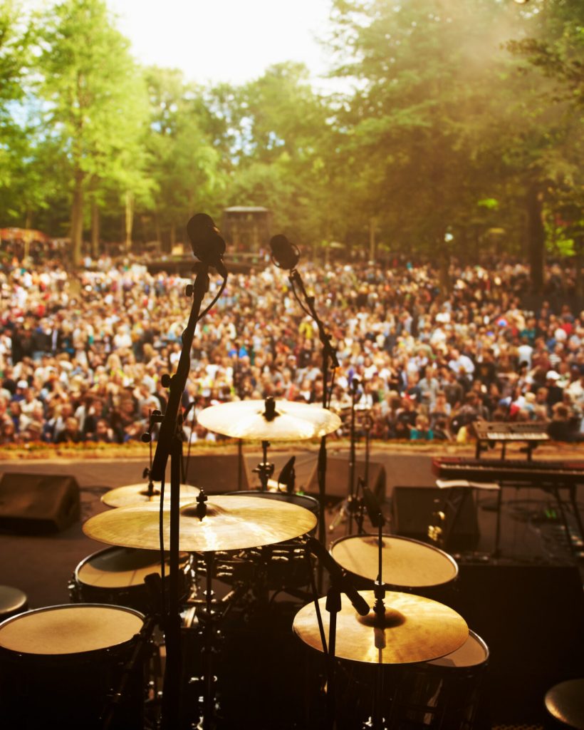 REady to rock. Cropped shot of a musicians feet on stage at an outdoor music festival